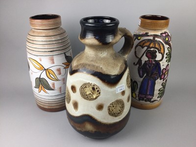 Lot 134 - A WEST GERMAN VASE WITH HANDLE AND TWO OTHER WEST GERMAN VASES