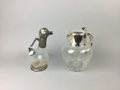 Lot 143 - A SILVER PLATED AND GLASS DECANTER MODELLED AS DUCK AND ANOTHER