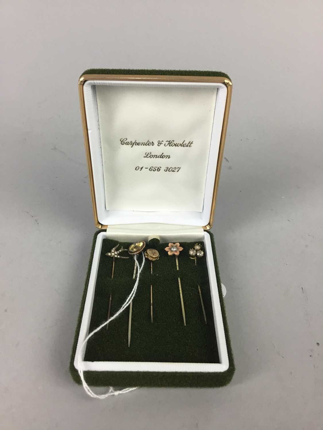 Lot 6 - A VICTORIAN GOLD AND DIAMOND STICK PIN ALONG WITH FOUR OTHERS