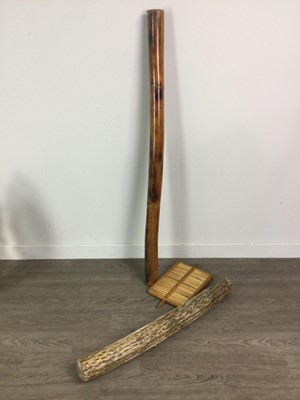 Lot 149 - A TRADITIONAL RAIN STICK AND TWO OTHER TRADITIONAL INSTRUMENTS
