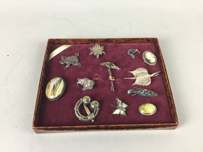 Lot 10 - A COLLECTION OF THIRTEEN VINTAGE SILVER BROOCHES