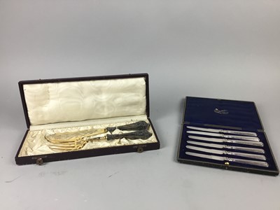 Lot 12 - A SET OF SIX SILVER HANDLED DESSERT KNIVES ALONG WITH A PAIR OF CONTINENTAL SILVER HANDLED SERVERS