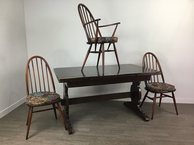 Lot 191 - AN ERCOL STAINED ELM DRAW LEAF TABLE, SIX CHAIRS AND A DRESSER