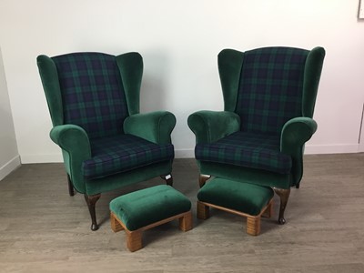 Lot 193 - A PAIR OF REPRODUCTION WINGBACK ARMCHAIRS EACH WITH FOOTSTOOLS