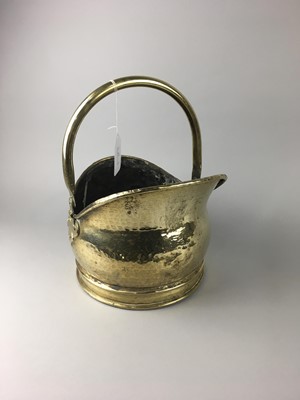 Lot 44 - A HAMMERED BRASS COAL BUCKET ALONG WITH FIRESIDE COMPANION STAND