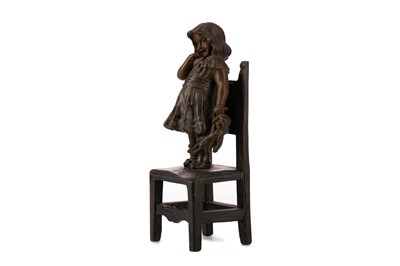 Lot 1043 - AN EARLY 20TH CENTURY BRONZE FIGURE OF A GIRL ON A CHAIR