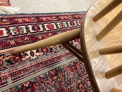 Lot 1048 - A SET OF FOUR ERCOL BLONDE ELM DINING CHAIRS