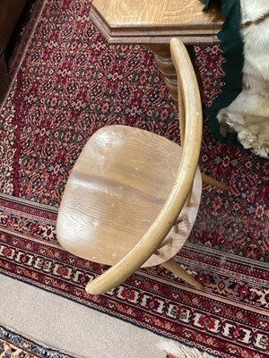 Lot 1048 - A SET OF FOUR ERCOL BLONDE ELM DINING CHAIRS