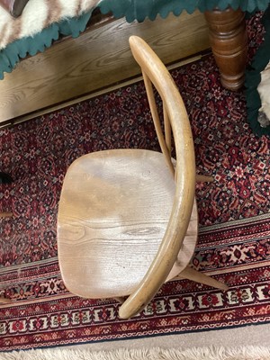 Lot 1048 - A SET OF FOUR ERCOL BLONDE ELM DINING CHAIRS