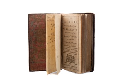 Lot 1057 - AN 18TH CENTURY HOLY BIBLE
