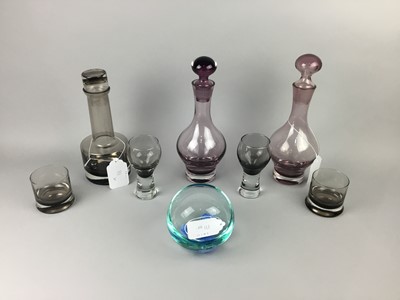 Lot 111 - A CAITHNESS AMETHYST GLASS LIQUEUR SET ALONG WITH ANOTHER