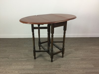 Lot 327 - AN OAK DROP LEAF OVAL TABLE AND A MAHOGANY SIDE TABLE