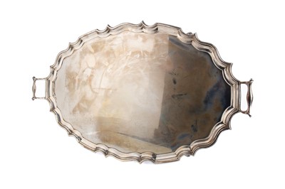 Lot 494 - A LARGE AND IMPRESSIVE GEORGE V SILVER TWIN HANDLED SERVING TRAY
