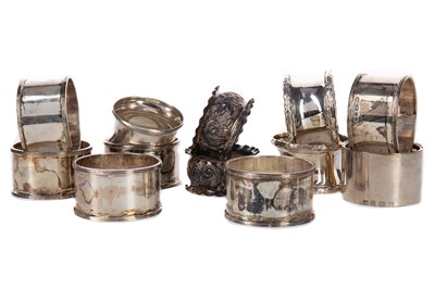 Lot 507 - A COLLECTION OF TWELVE SILVER NAPKIN RINGS