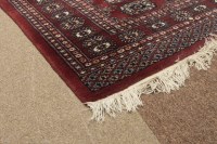 Lot 814 - EARLY 20TH CENTURY EASTERN RUG in red with...