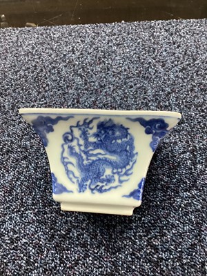 Lot 1103 - A CHINESE BLUE AND WHITE MINIATURE PLANTER