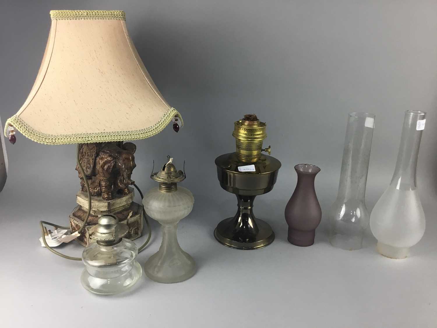 Lot 406 - A TABLE LAMP ALONG WITH AN OIL LAMP AND OIL LAMP PARTS
