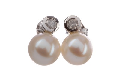 Lot 1323 - A PAIR OF PEARL AND DIAMOND EARRINGS