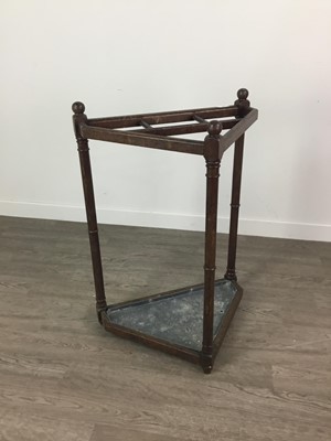 Lot 480 - AN EARLY 20TH CENTURY STAINED WOOD UMBRELLA AND STICK STAND