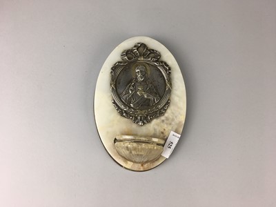 Lot 117 - A WHITE METAL AND ONYX RELIGIOUS WALL HOLY WATER FONT