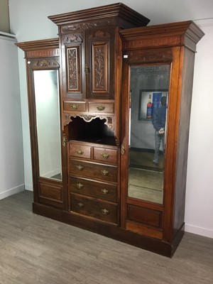 Lot 383 - AN OAK TRIPLE WARDROBE