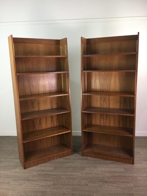 Lot 384 - A PAIR OF TEAK OPEN BOOKCASES