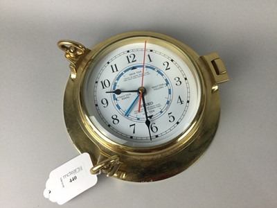 Lot 440 - A SEIKO SHIP'S TYPE BINNACLE BRASS CLOCK