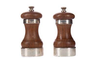 Lot 521 - A PAIR OF SILVER MOUNTED SALT AND PEPPER GRINDERS