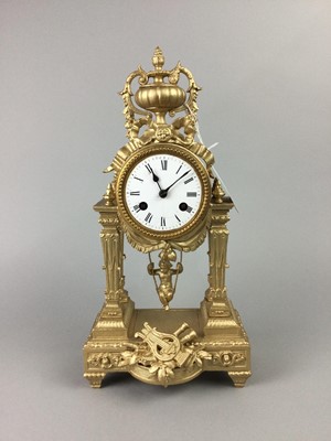 Lot 509 - A GILTMETAL MANTEL CLOCK