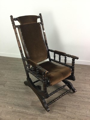 Lot 512 - A 19TH CENTURY AMERICAN SPRING ROCKER ARM CHAIR