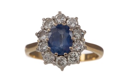 Lot 1435 - A SAPPHIRE AND DIAMOND CLUSTER RING
