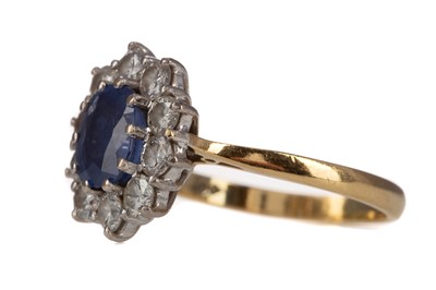 Lot 1435 - A SAPPHIRE AND DIAMOND CLUSTER RING