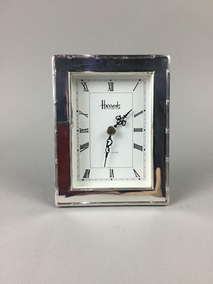 Lot 572 - A HARRODS SILVER CLOCK