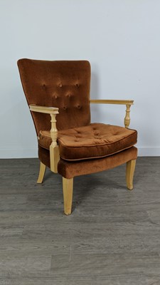 Lot 611 - AN UPHOLSETERED OPEN ELBOW CHAIR