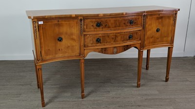 Lot 606 - A REPRODUCTION YEW WOOD DINING SUITE