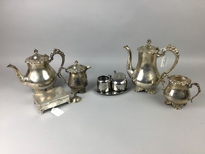 Lot 83 - A SILVER PLATED FOUR PIECE TEA SERVICE ALONG WITH OTHER TEA WARE
