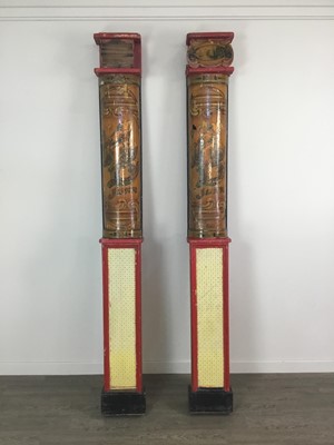 Lot 1148 - A RARE PAIR OF HAND PAINTED FAIRGROUND RIDE COLUMNS