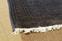 Lot 901 - EARLY 20TH CENTURY EASTERN RUG with geometric...