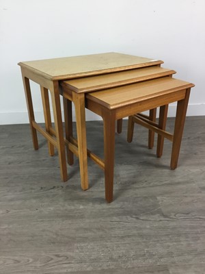 Lot 230 - A TEAK NEST OF THREE TABLES AND A TELEPHONE TABLE