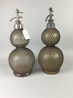 Lot 262 - A PAIR OF OVERSIZED SIPHONS