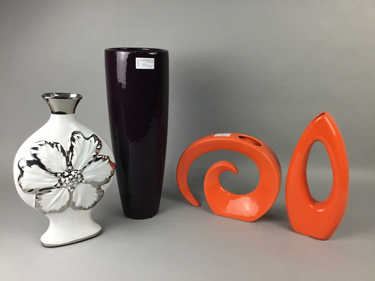 Lot 291 - A CONTEMPORARY CERAMIC VASE, FIVE OTHERS AND AN OVERSIZED WINE GLASS