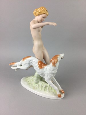 Lot 329 - A ROYAL DUX FIGURE OF A NAKED FEMALE WITH DOG