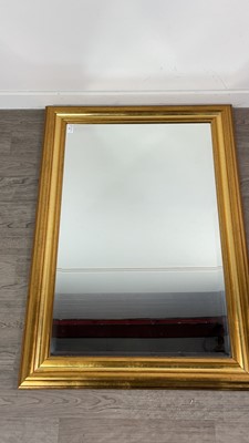 Lot 302 - A MODERN GILT FRAMED WALL MIRROR