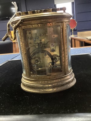 Lot 602 - A LATE 19TH CENTURY BRASS REPEATER CARRIAGE CLOCK