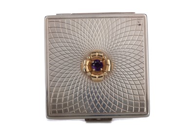 Lot 17 - A TIFFANY & CO. SILVER AND 14 CARAT GOLD COMPACT