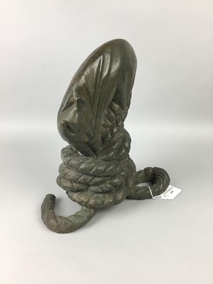 Lot 430 - A BRONZE CAT ON ROPE SCULPTURE