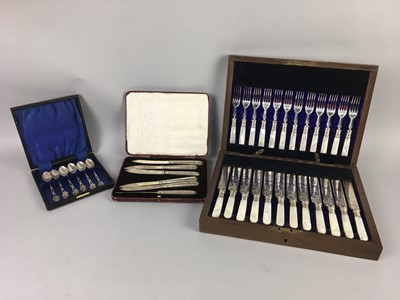 Lot 449 - A SET OF TWELVE VICTORIAN DESSERT KNIVES AND FORKS