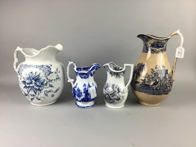 Lot 462 - A BLUE AND WHITE EWER AND OTHER BLUE AND WHITE JUGS