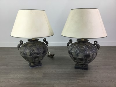 Lot 581 - A PAIR OF ARCHAIC STYLE METAL TABLE LAMPS