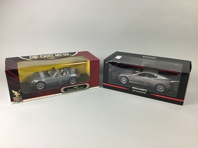 Lot 509 - FOUR BOXED MODEL CARS